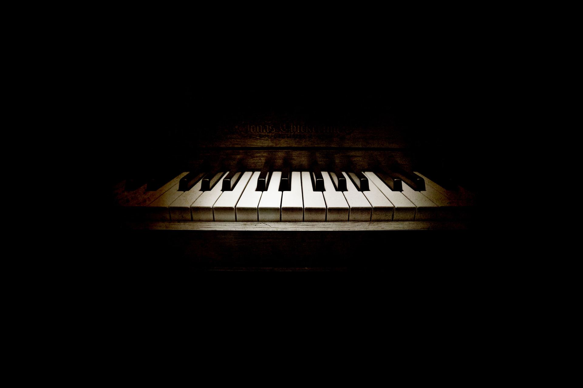 Close-up of a piano keyboard ready for tuning